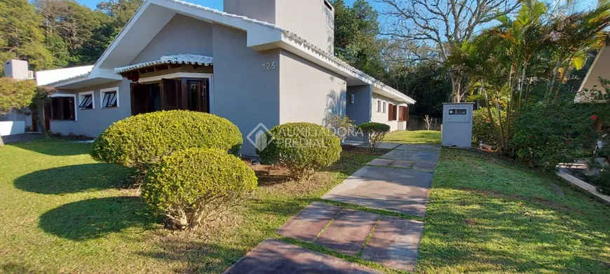 Foto 1 de Casa de Condomínio com 4 Quartos à venda, 270m² em Altos da Alegria, Guaíba