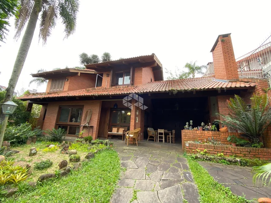 Foto 1 de Casa com 2 Quartos à venda, 262m² em Jardim Isabel, Porto Alegre