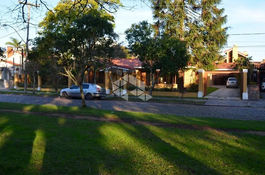 Foto 1 de Casa com 4 Quartos à venda, 412m² em Vila Assunção, Porto Alegre