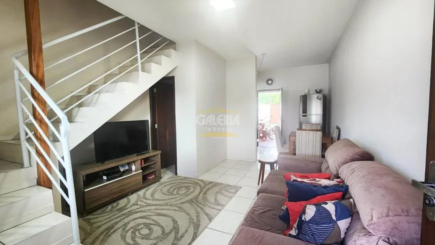 Foto 1 de Sobrado com 2 Quartos à venda, 64m² em Espinheiros, Joinville