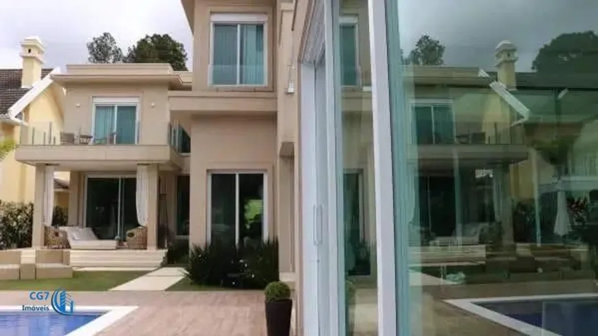 Foto 1 de Casa de Condomínio com 5 Quartos para venda ou aluguel, 740m² em Alphaville, Santana de Parnaíba