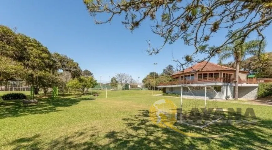 Foto 1 de Casa de Condomínio com 5 Quartos à venda, 420m² em Cavalhada, Porto Alegre