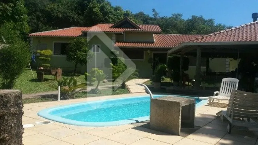 Foto 1 de Casa com 4 Quartos à venda, 136m² em Aberta dos Morros, Porto Alegre