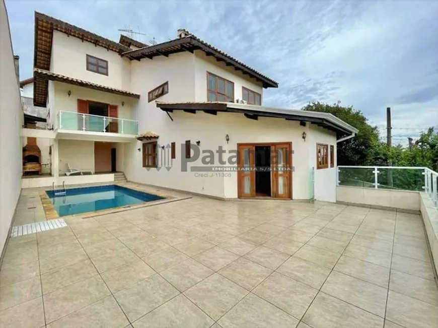 Foto 1 de Casa de Condomínio com 4 Quartos à venda, 357m² em Granja Viana, Carapicuíba