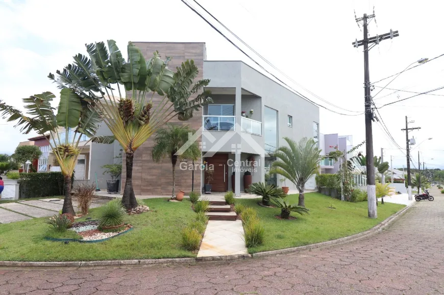 Foto 1 de Casa de Condomínio com 4 Quartos à venda, 240m² em Balneario Tres Marias , Peruíbe