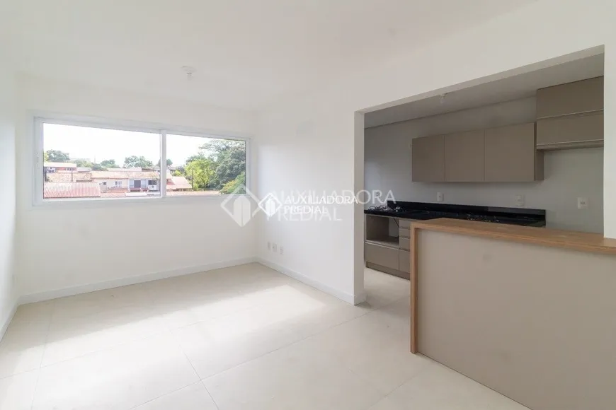 Foto 1 de Apartamento com 3 Quartos à venda, 68m² em Santo Antônio, Porto Alegre