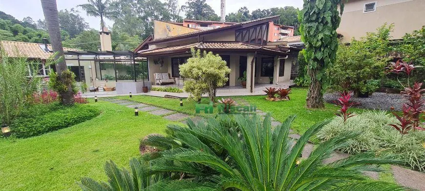 Foto 1 de Casa com 4 Quartos para venda ou aluguel, 332m² em Parque das Cigarreiras, Taboão da Serra