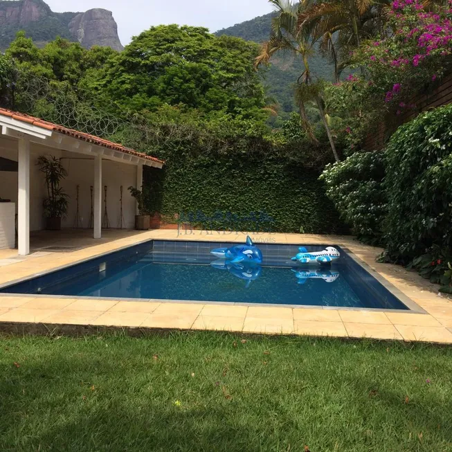 Foto 1 de Casa de Condomínio com 4 Quartos para alugar, 498m² em Itanhangá, Rio de Janeiro