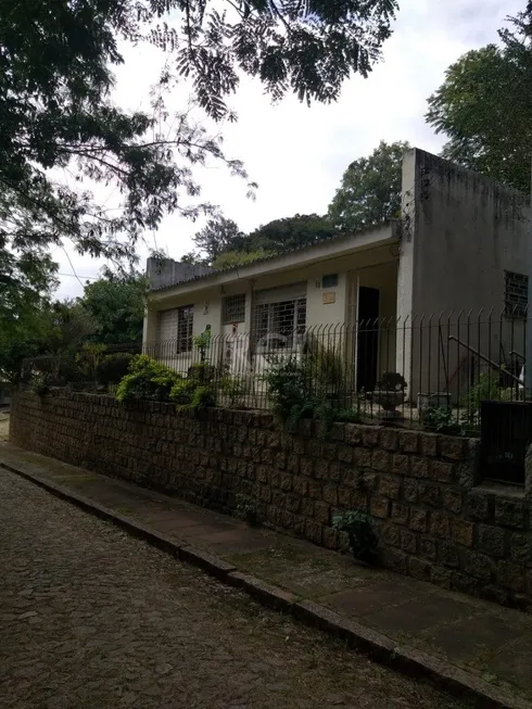 Foto 1 de Casa de Condomínio com 3 Quartos à venda, 86m² em Teresópolis, Porto Alegre