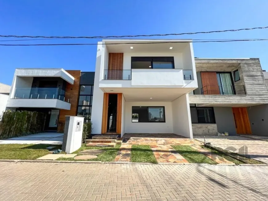 Foto 1 de Casa de Condomínio com 3 Quartos à venda, 200m² em Ipanema, Porto Alegre