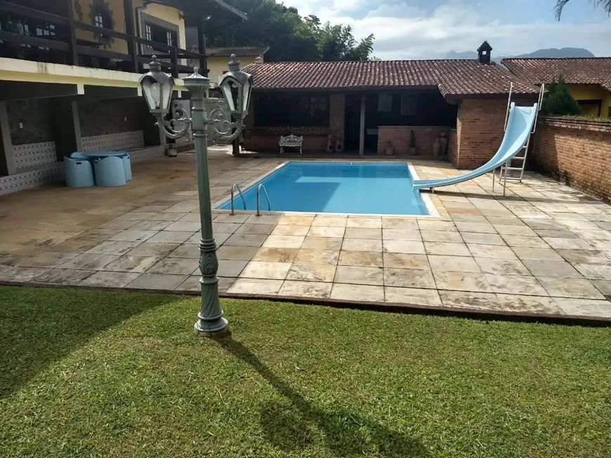 Foto 1 de Casa de Condomínio com 5 Quartos à venda, 286m² em Cantagalo, Guapimirim