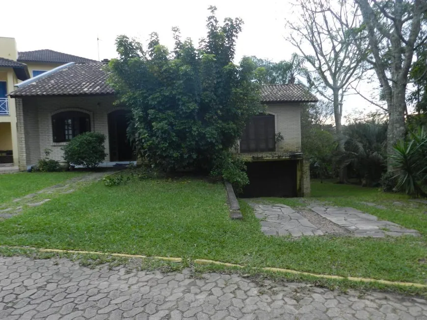 Foto 1 de Casa com 4 Quartos à venda, 299m² em Cantegril, Viamão