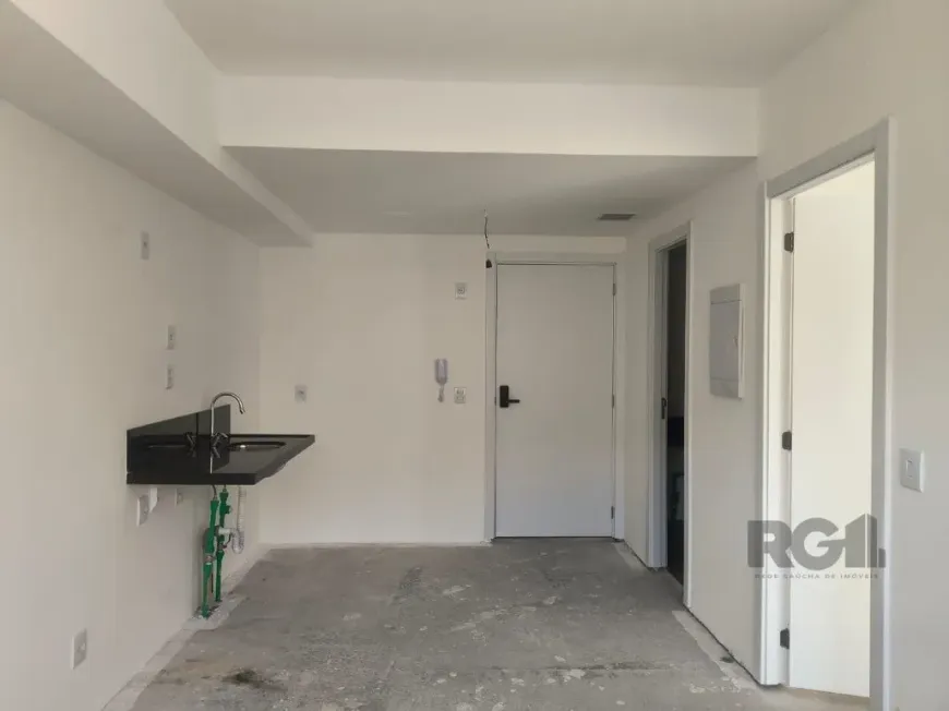 Foto 1 de Apartamento com 1 Quarto à venda, 32m² em Rio Branco, Porto Alegre