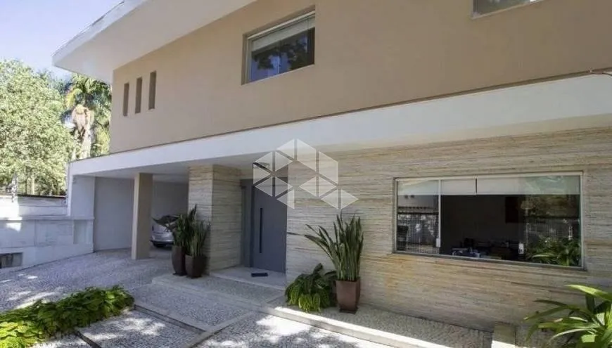 Foto 1 de Casa com 4 Quartos à venda, 480m² em Jardim Europa, São Paulo