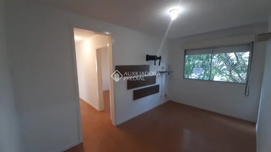 Foto 1 de Apartamento com 3 Quartos à venda, 63m² em Santo Antônio, Porto Alegre