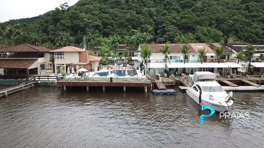 Foto 1 de Casa de Condomínio com 2 Quartos à venda, 142m² em Balneário Praia do Perequê , Guarujá