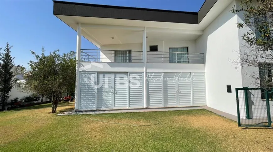 Foto 1 de Sobrado com 4 Quartos à venda, 425m² em Residencial Alphaville Flamboyant, Goiânia