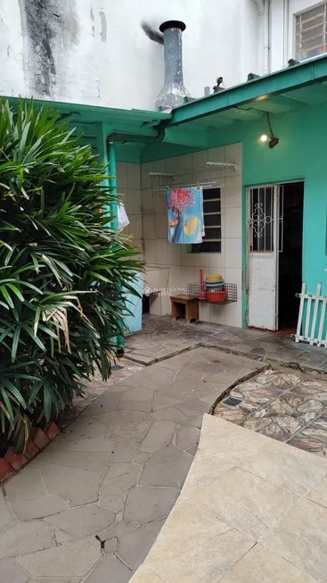 Foto 1 de Casa com 2 Quartos à venda, 100m² em Rio Branco, Porto Alegre