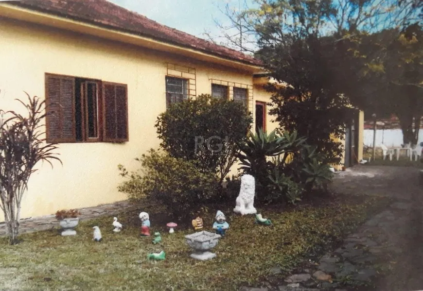 Foto 1 de Casa com 3 Quartos à venda, 69m² em Aberta dos Morros, Porto Alegre
