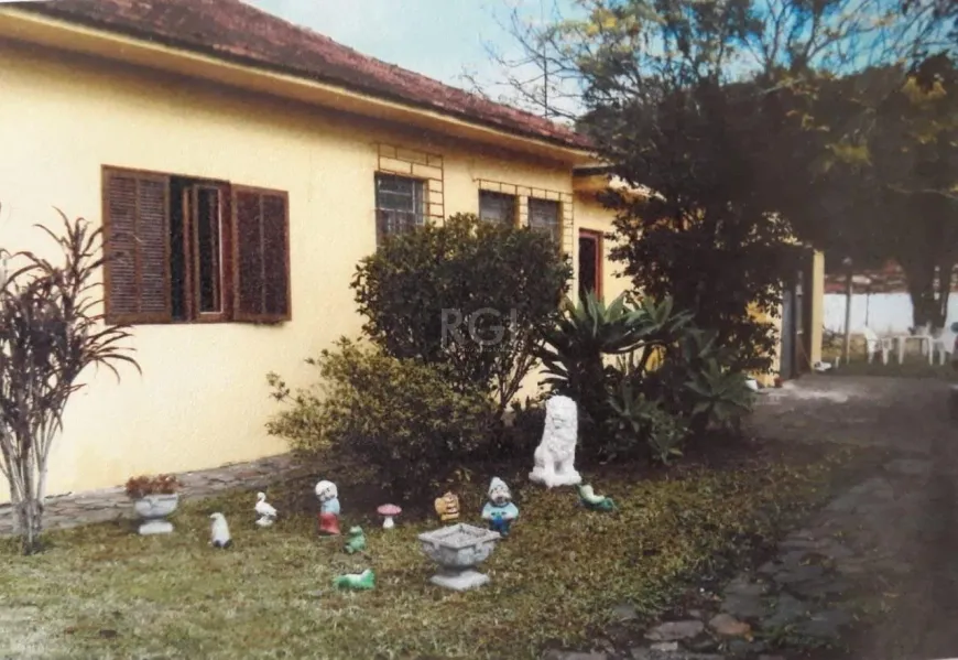 Foto 1 de Casa com 3 Quartos à venda, 71m² em Aberta dos Morros, Porto Alegre