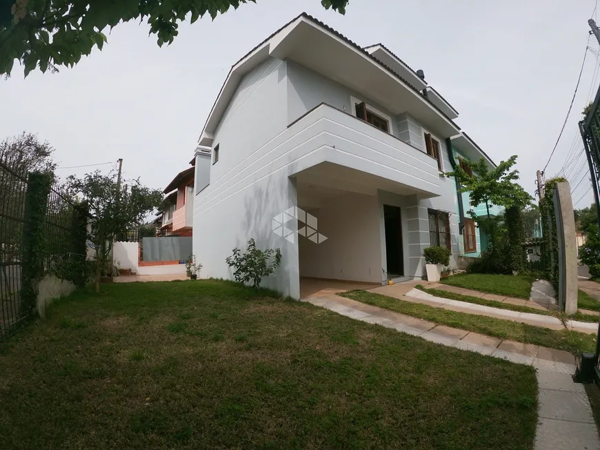 Foto 1 de Casa com 3 Quartos à venda, 143m² em Guarujá, Porto Alegre