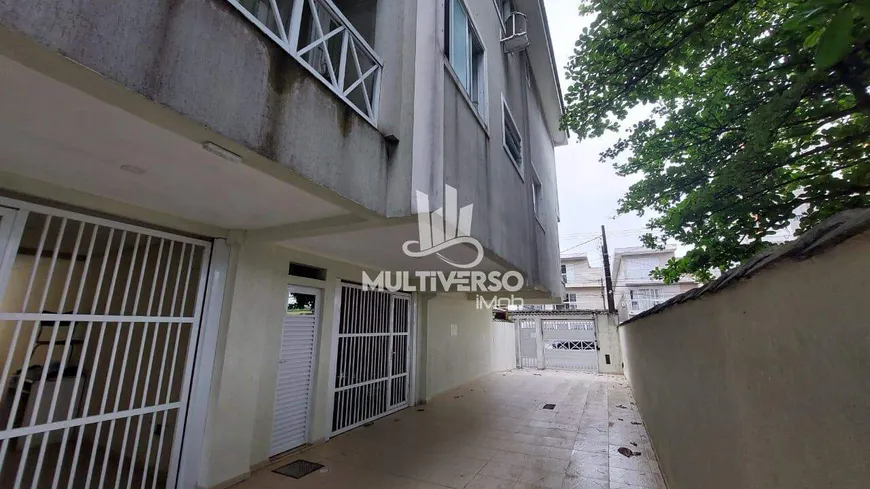Foto 1 de Casa com 4 Quartos à venda, 149m² em Macuco, Santos