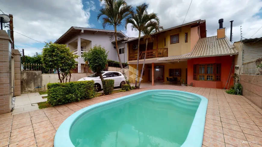 Foto 1 de Casa com 3 Quartos à venda, 300m² em Rubem Berta, Porto Alegre