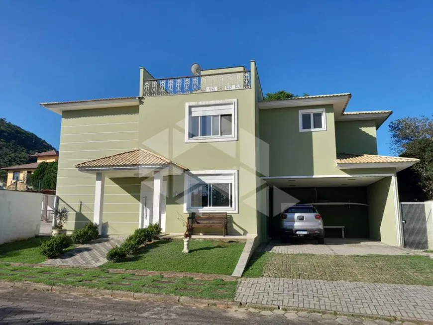 Foto 1 de Casa de Condomínio com 4 Quartos para alugar, 361m² em Campeche, Florianópolis