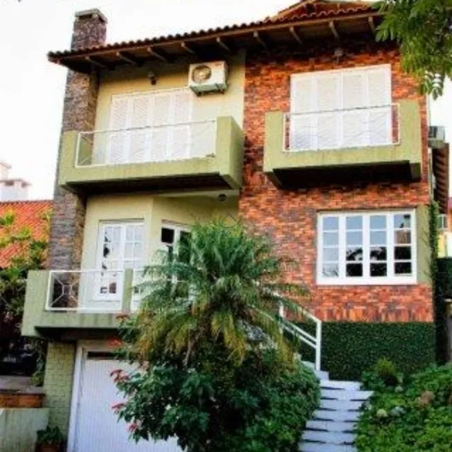 Foto 1 de Casa com 5 Quartos à venda, 300m² em Espiríto Santo, Porto Alegre