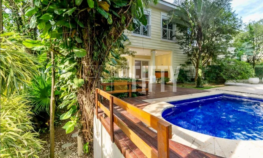 Foto 1 de Casa de Condomínio com 4 Quartos para venda ou aluguel, 710m² em Chácara Flora, São Paulo