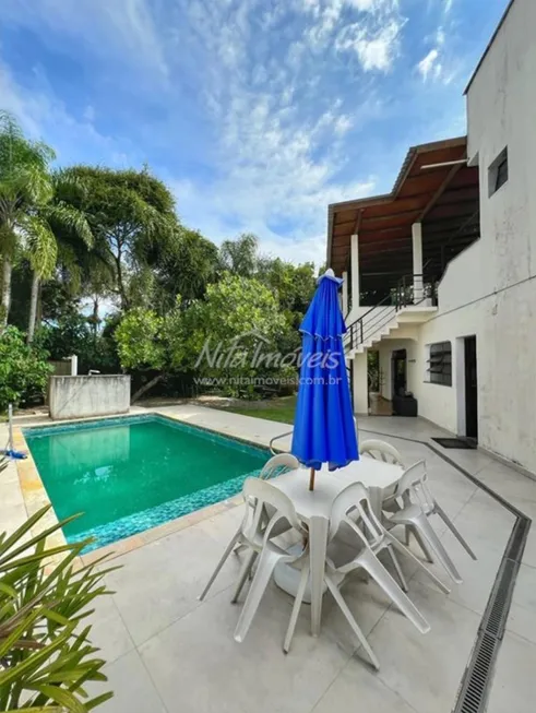 Foto 1 de Casa de Condomínio com 6 Quartos à venda, 397m² em Loteamento Costa do Sol, Bertioga