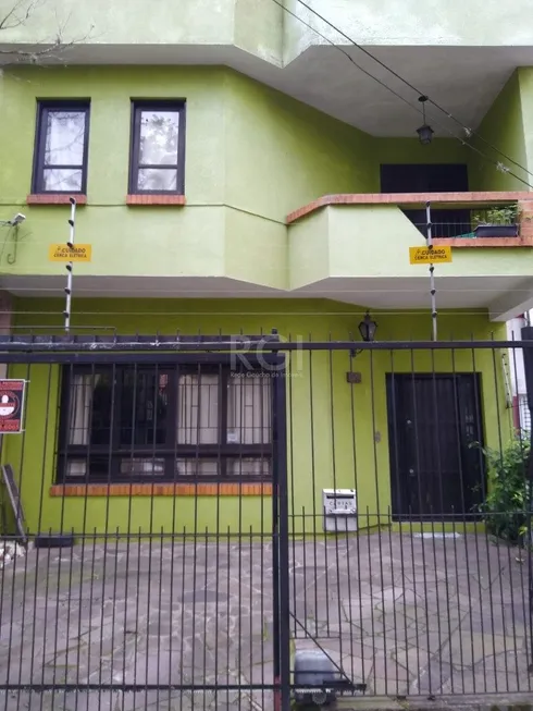 Foto 1 de Casa com 5 Quartos à venda, 266m² em Floresta, Porto Alegre