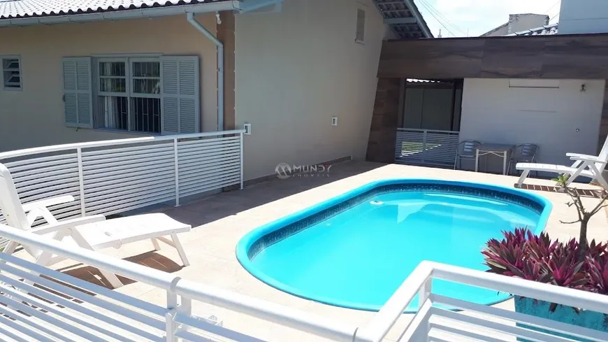 Foto 1 de Casa com 4 Quartos para alugar, 100m² em Canasvieiras, Florianópolis
