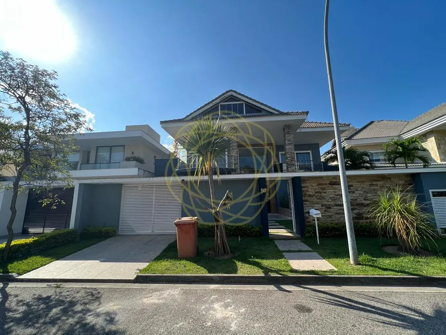 Foto 1 de Casa de Condomínio com 4 Quartos para venda ou aluguel, 750m² em Barra da Tijuca, Rio de Janeiro