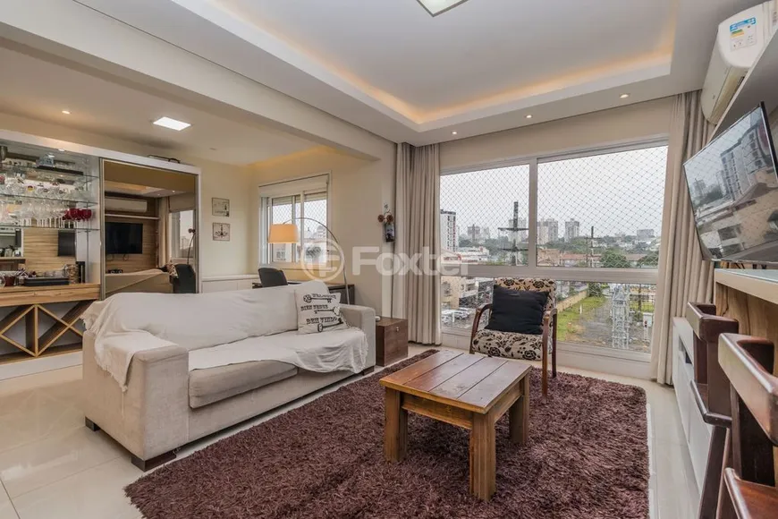 Foto 1 de Apartamento com 3 Quartos à venda, 79m² em Passo da Areia, Porto Alegre