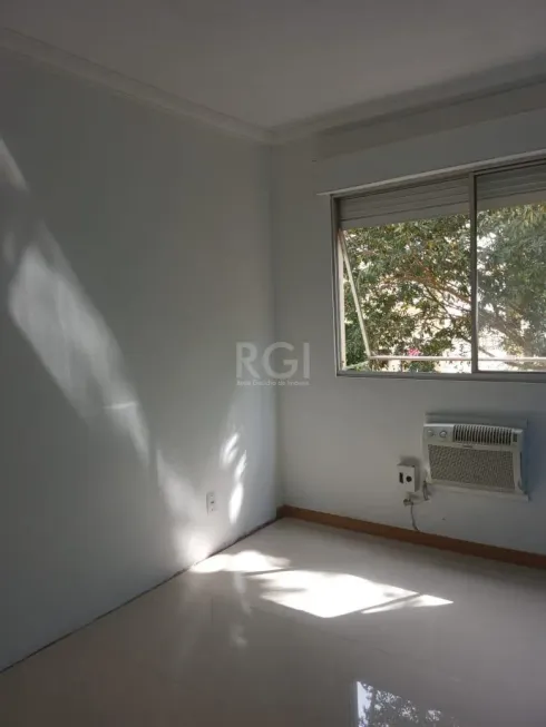 Foto 1 de Apartamento com 2 Quartos à venda, 61m² em Vila Nova, Porto Alegre