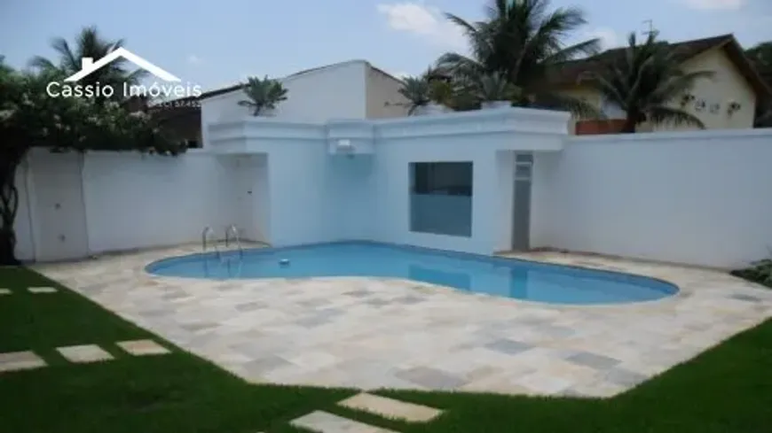 Foto 1 de Casa de Condomínio com 7 Quartos à venda, 450m² em Jardim Acapulco , Guarujá