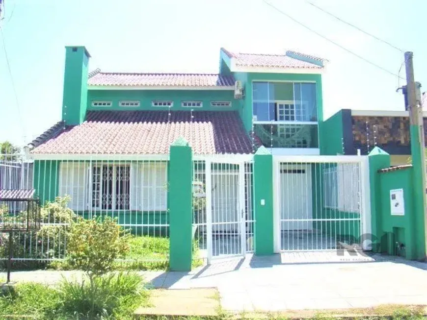 Foto 1 de Casa com 4 Quartos à venda, 251m² em Espiríto Santo, Porto Alegre