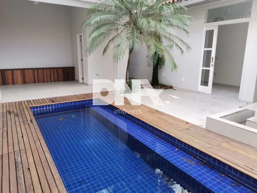 Foto 1 de Casa com 4 Quartos à venda, 239m² em Lagoa, Rio de Janeiro