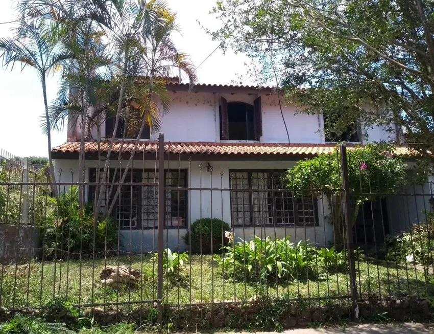 Foto 1 de Casa com 4 Quartos à venda, 202m² em Pedra Redonda, Porto Alegre