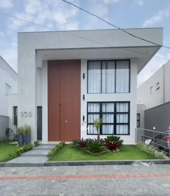 Foto 1 de Casa de Condomínio com 4 Quartos à venda, 450m² em Estância Silveira, Contagem