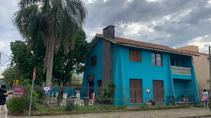 Foto 1 de Casa com 3 Quartos à venda, 176m² em Guarujá, Porto Alegre