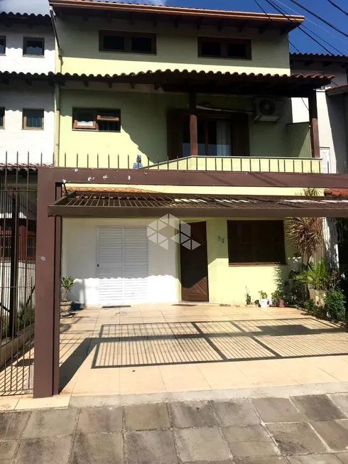 Foto 1 de Casa com 3 Quartos à venda, 210m² em Vila Nova, Porto Alegre