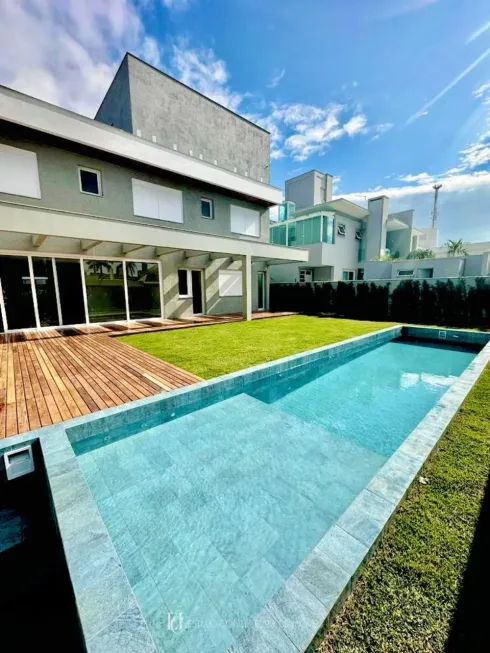 Foto 1 de Casa com 6 Quartos à venda, 430m² em Jurerê Internacional, Florianópolis