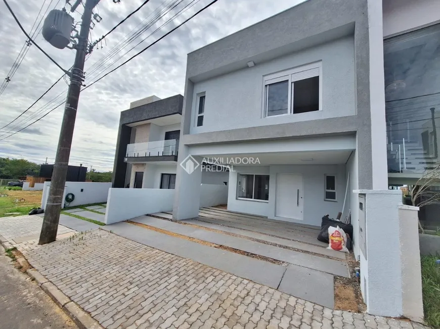 Foto 1 de Casa de Condomínio com 3 Quartos à venda, 190m² em Mário Quintana, Porto Alegre