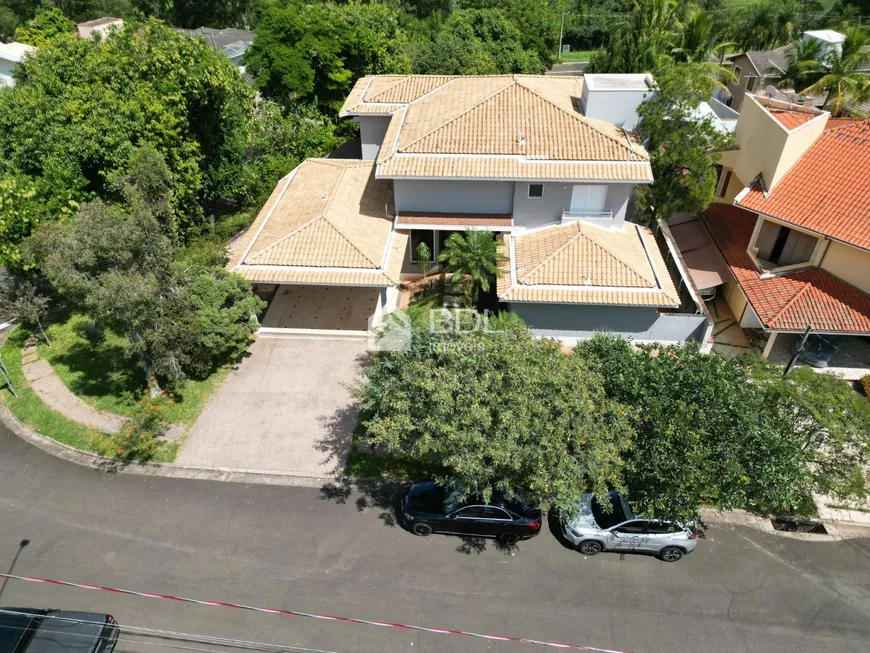 Foto 1 de Casa de Condomínio com 4 Quartos à venda, 400m² em Loteamento Alphaville Campinas, Campinas