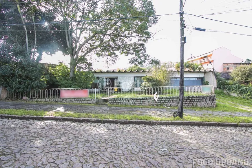 Foto 1 de Casa com 4 Quartos à venda, 256m² em Cavalhada, Porto Alegre