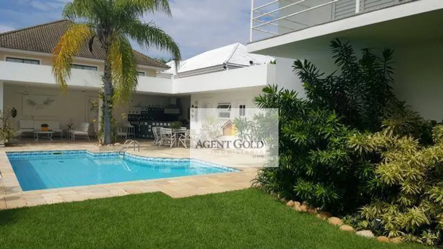 Foto 1 de Casa de Condomínio com 4 Quartos à venda, 660m² em Barra da Tijuca, Rio de Janeiro