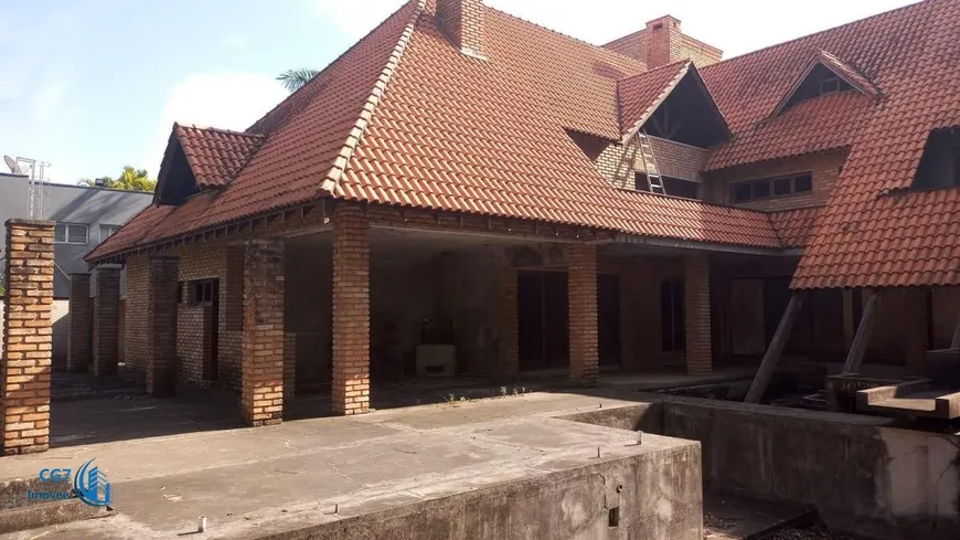 Foto 1 de Casa de Condomínio com 6 Quartos à venda, 1366m² em Tamboré, Barueri