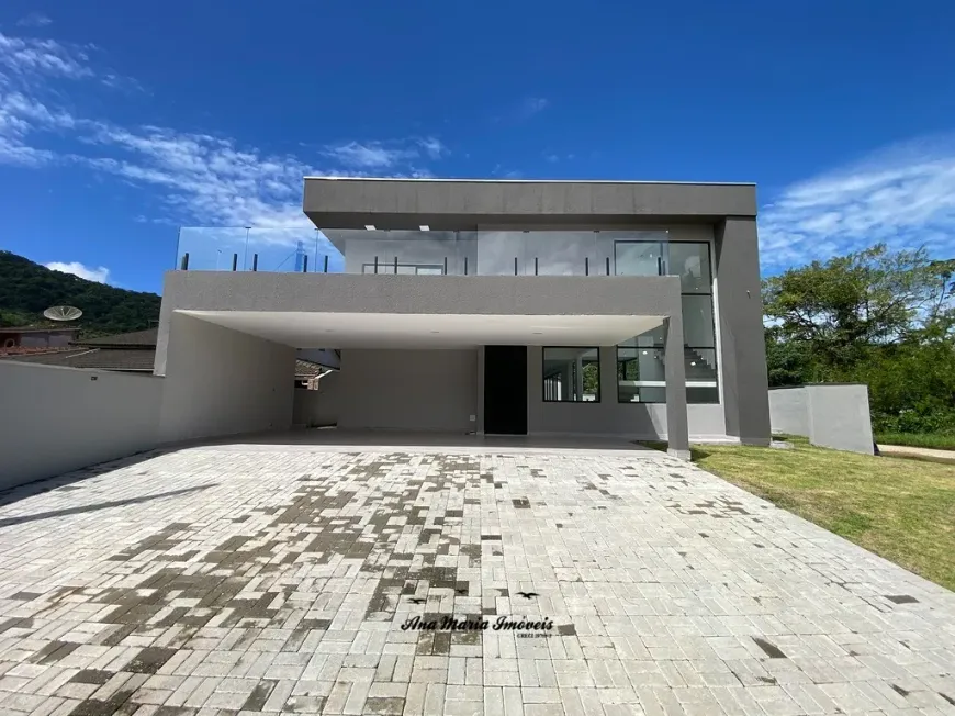 Foto 1 de Casa de Condomínio com 4 Quartos à venda, 298m² em Massaguaçu, Caraguatatuba